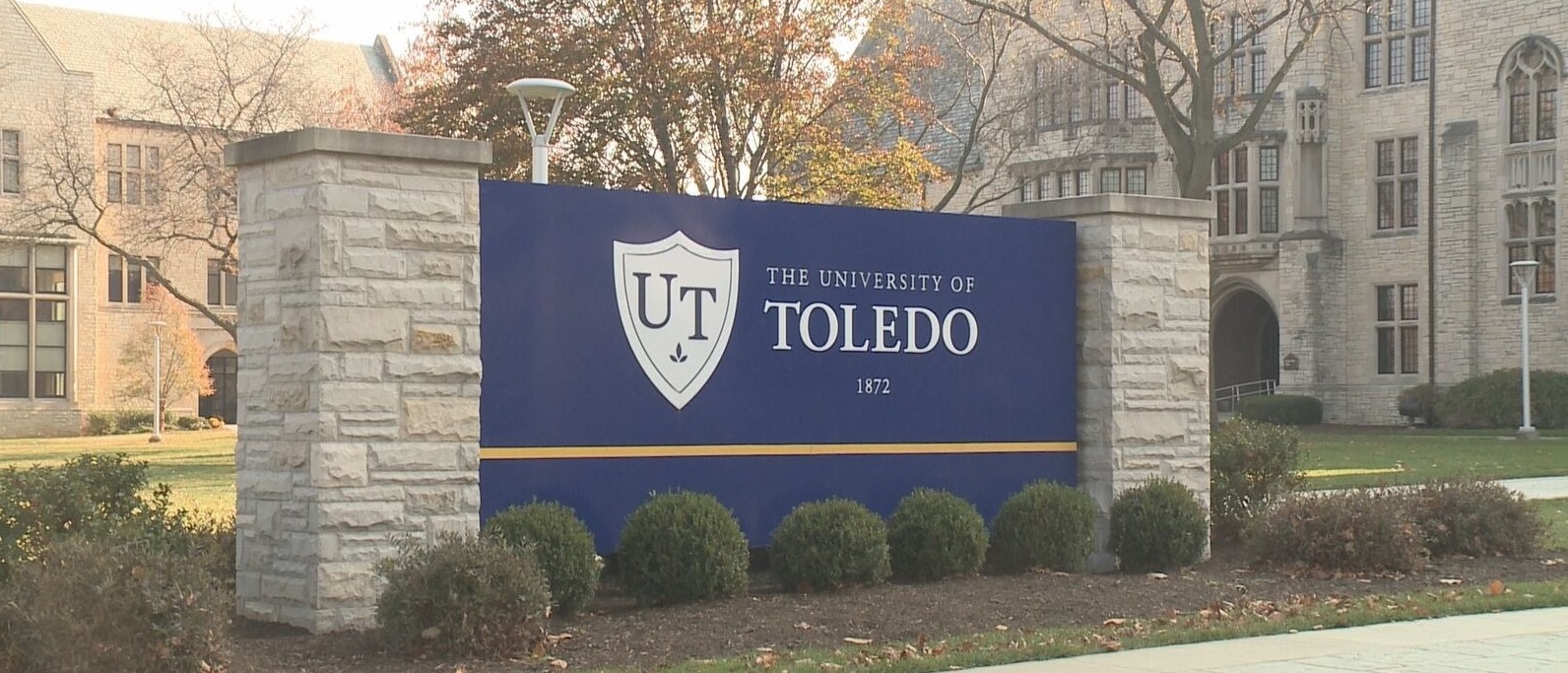 University of Toledo entrance sign and campus buildings